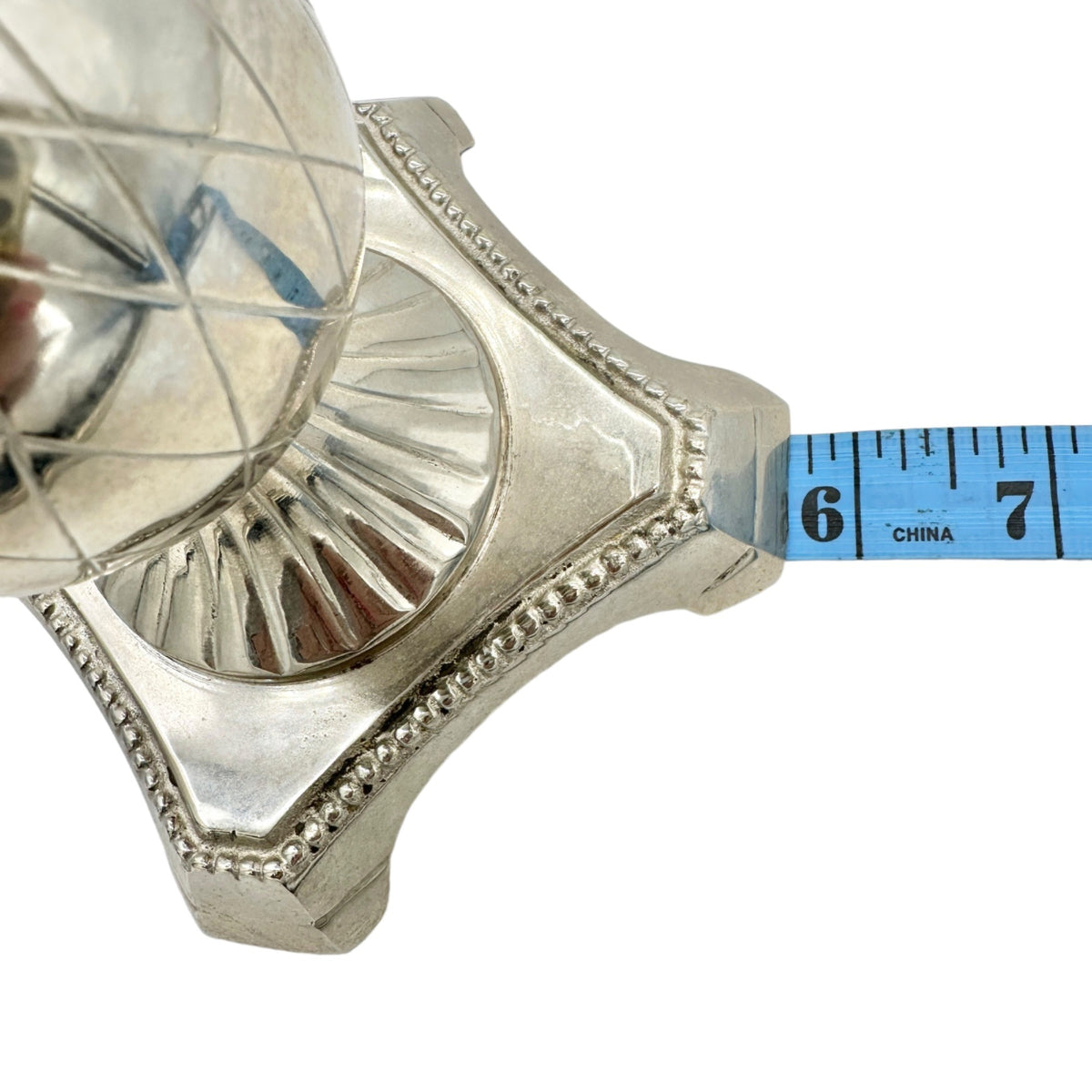 Elegant Silver Plated Candle Holder With Ornate Detailing And Fluted Base