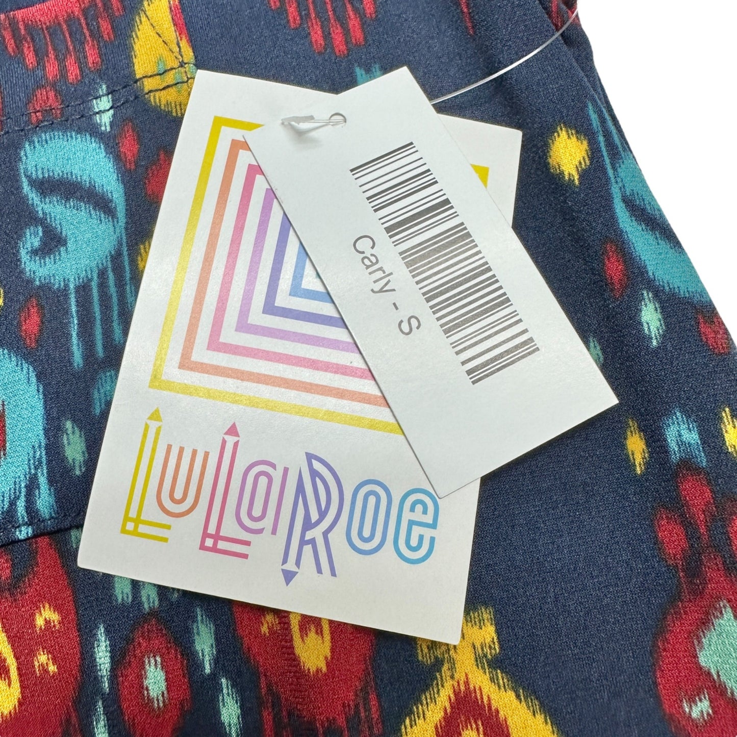 LuLaRoe Retired Carly Dress S Navy Blue Multicolor Graphic SS Hi-Low Hem NWT