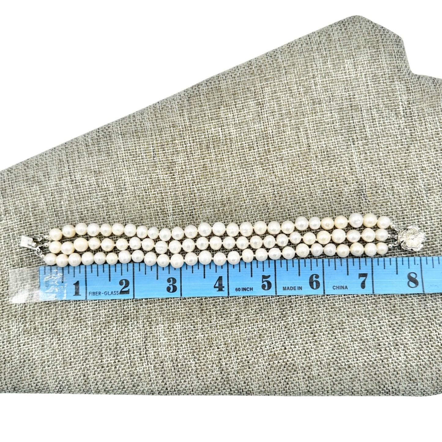 Vintage Triple Strand Faux Pearl Bracelet With Silver Flower Clasp 8 Inches Long
