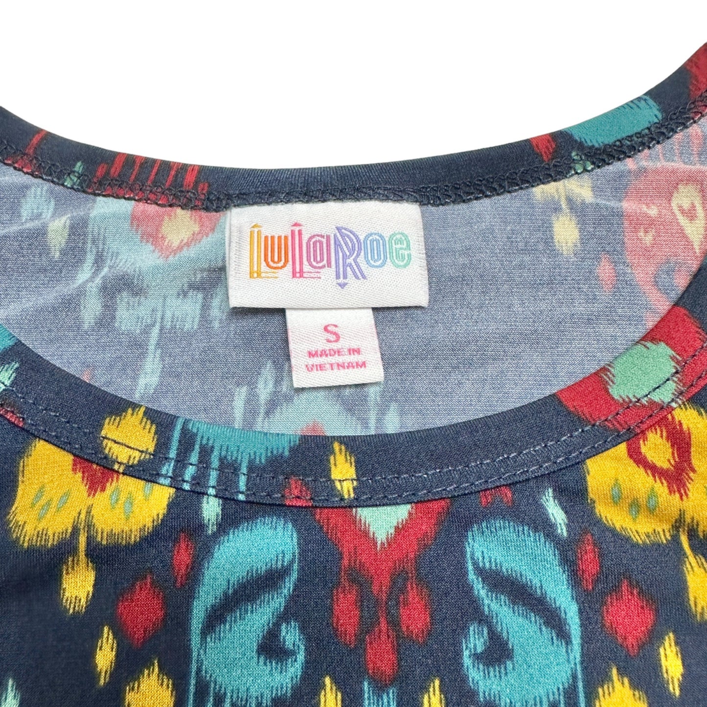 LuLaRoe Retired Carly Dress S Navy Blue Multicolor Graphic SS Hi-Low Hem NWT