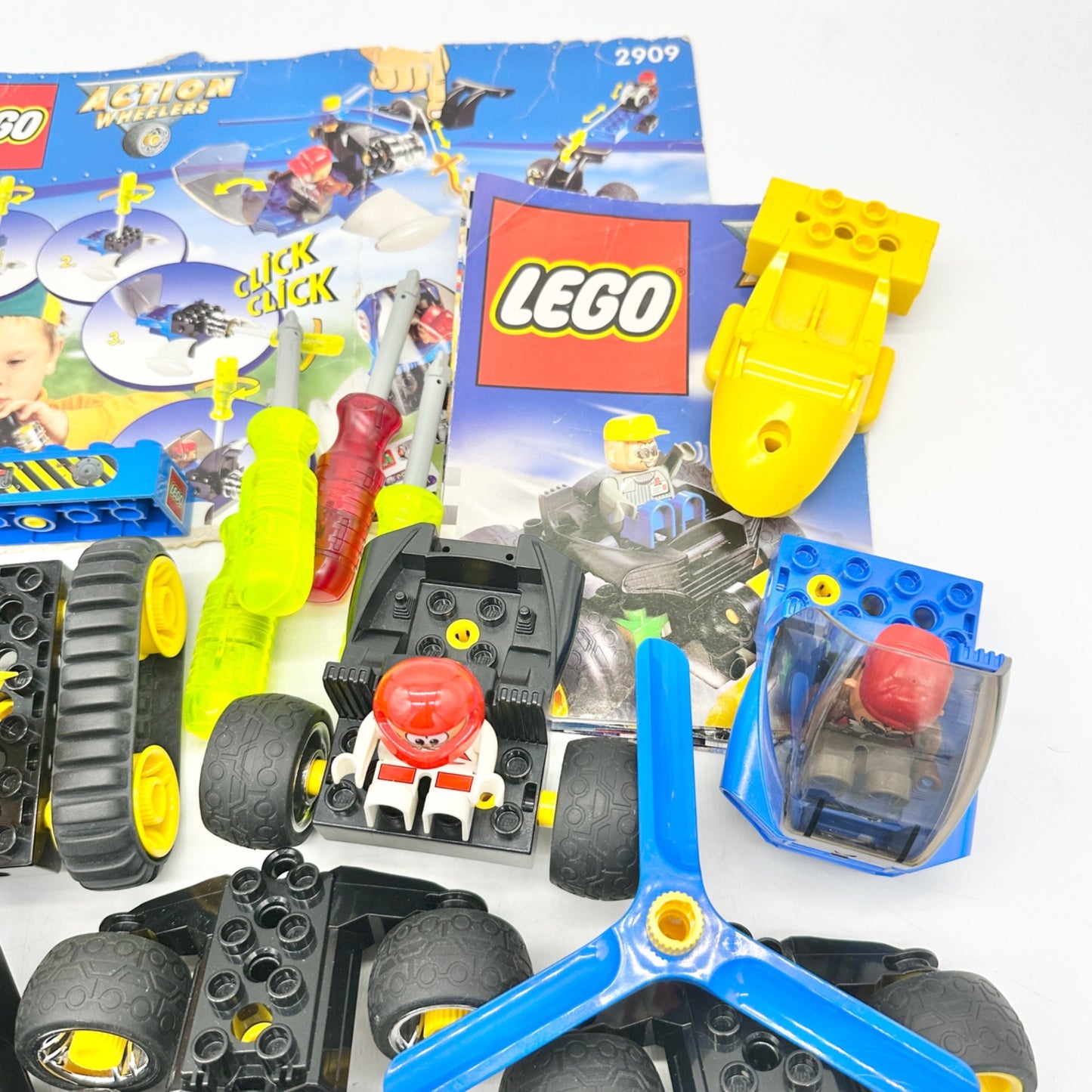 Lego Action Wheelers Misc Pieces Set -Figures Vehicles Tools Instructs Vtg 2909